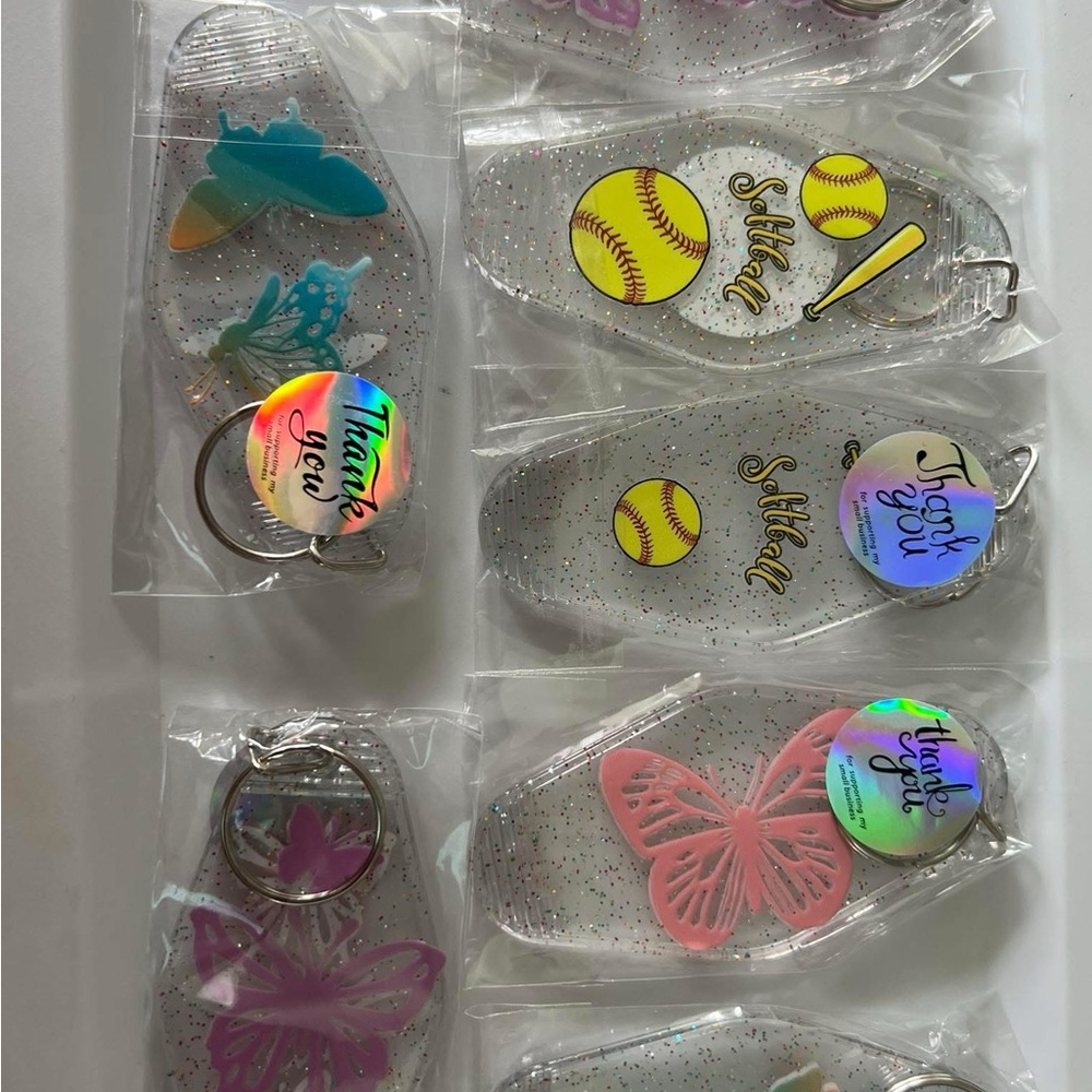 Clear Glitter Keychains with Sports and Butterfly Designs